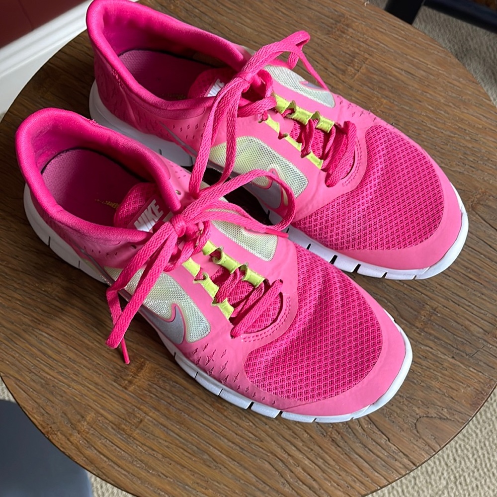 Nike youth size 7. Pink shoes. Worn but really good condition